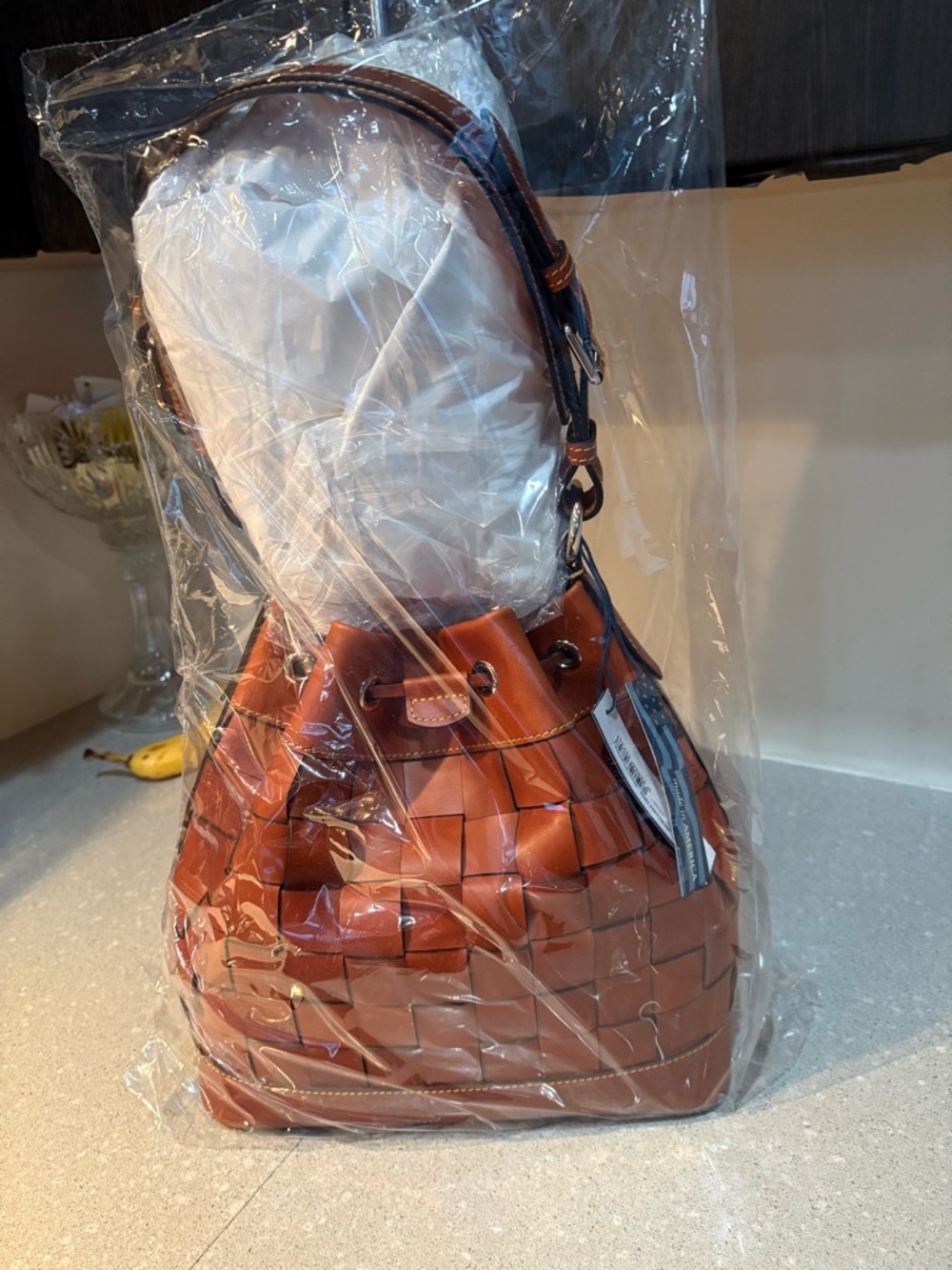 Dooney & Bourke Woven Belmar 30 Drawstring Shoulder Bag in tan. - Picture 4 of 7